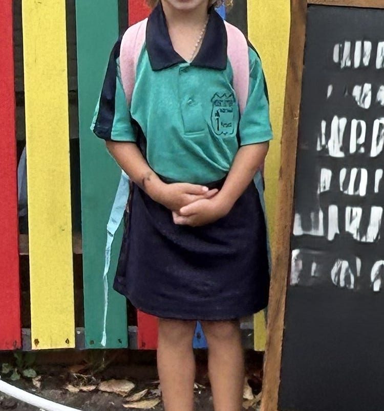 Photo of a student in a school polo and skorts